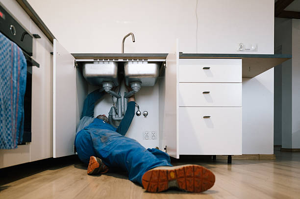 Professional Drain Cleaning technician working in Washburn, IL